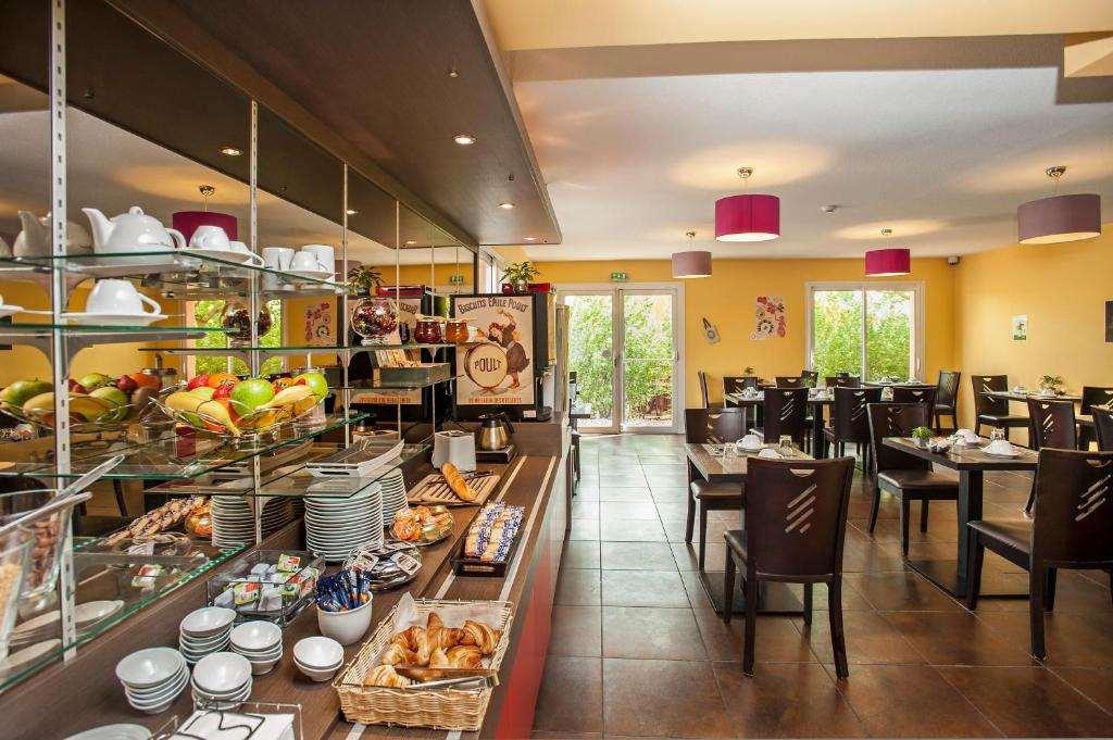 Brit Hotel Confort Villeneuve Sur Lot Bias  المطعم الصورة
